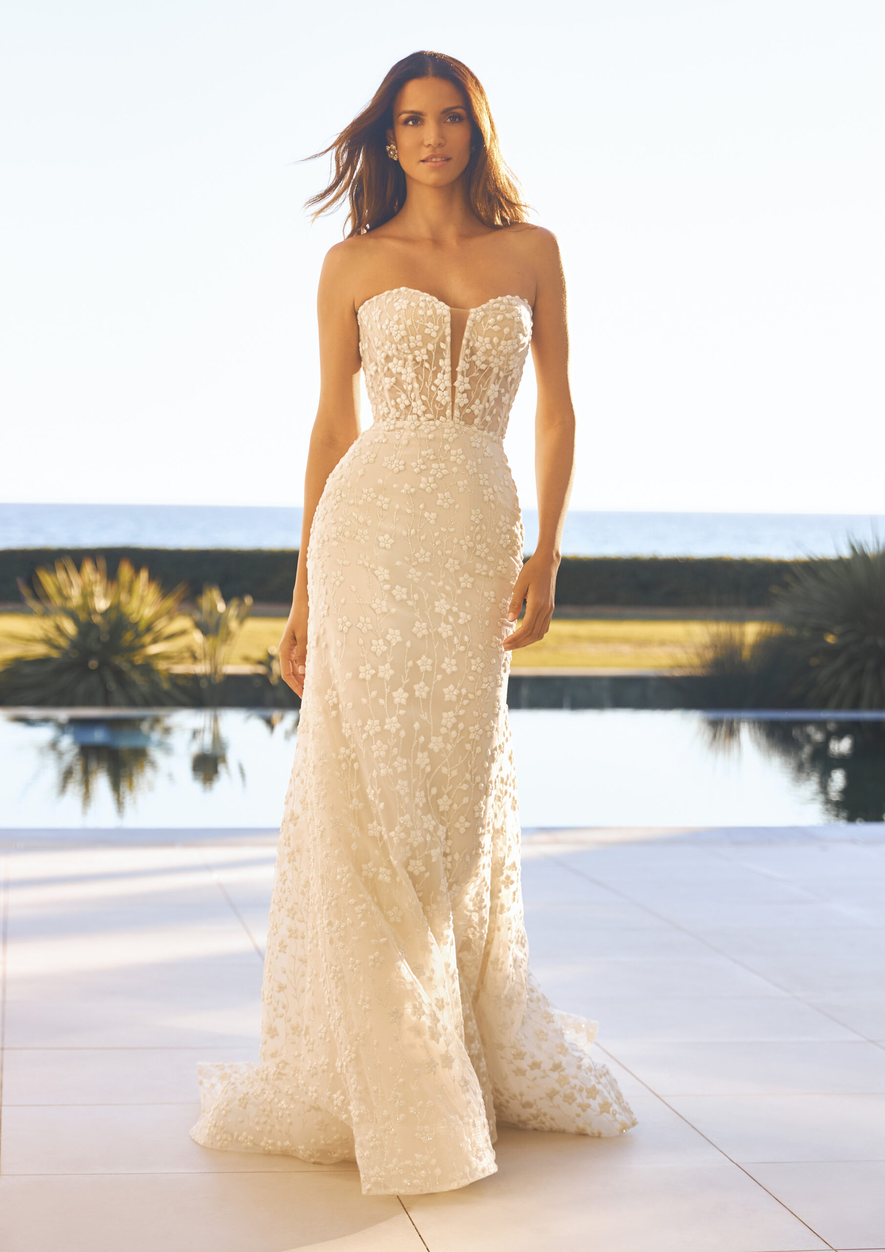Phoebe is a modern, sparkling lace, mermaid style wedding dress by Pronovias. It's available in Belladonna Bridal, Galway City.
