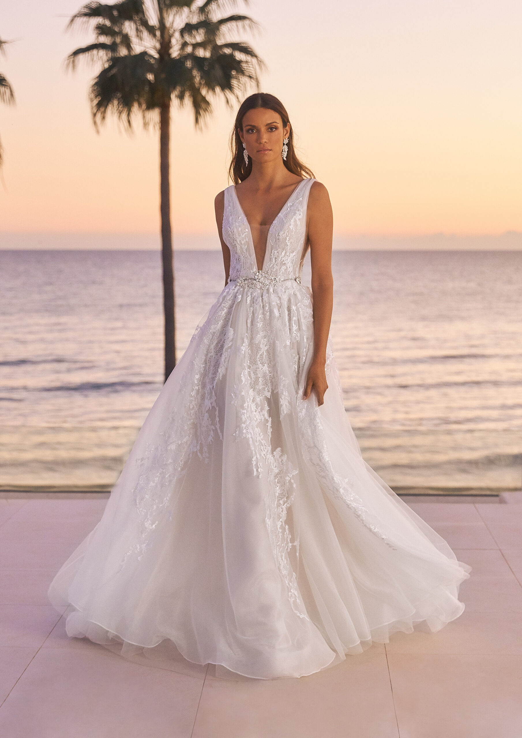 Tinka by Pronovias,  has all the elegance of a lace wedding dress with some fun elements of a boho bride. It's available in Belladonna Bridal, Galway
